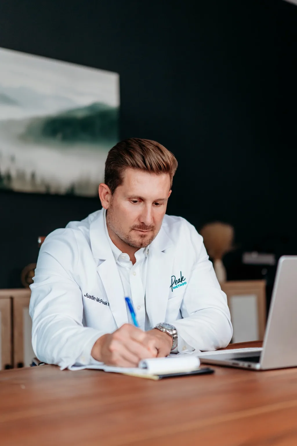 Justin McPeak reviewing hormone care notes