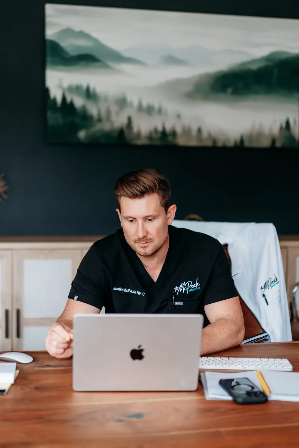 Justin McPeak reviewing hormone and peptide care plans